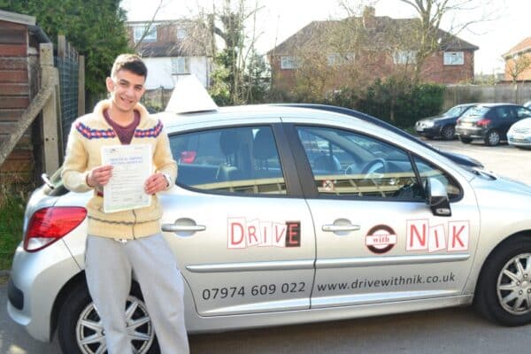 Mario passed his driving test first time
