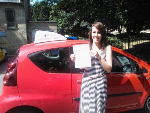 Laura passed her driving test first time